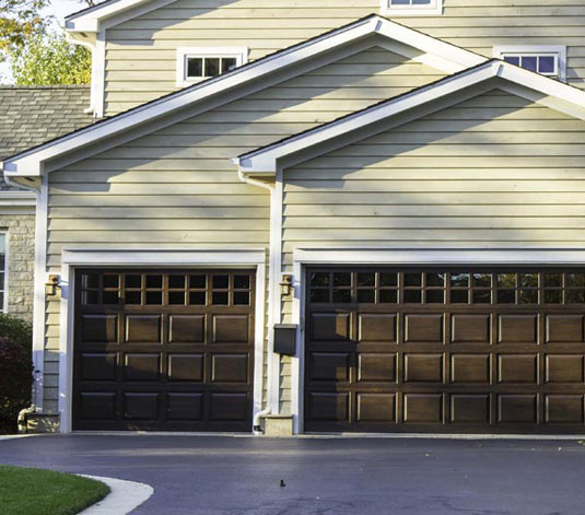 fixing-garage-7 Front view of a double garage door
