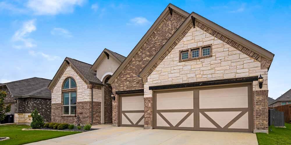 texas-home-with-tan-garage-door Texas home with a garage door | Reliable Garage Door Repair